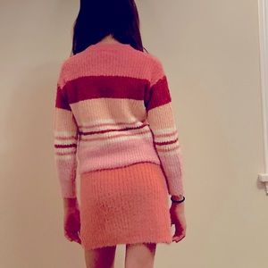 A pink sweater